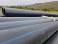 Plastic drainage pipes  pile connecting each other by the road Royalty Free Stock Photo