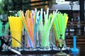 Plastic drinking vivid sraws in the restaurant bar