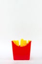 Plastic fast food, toy plastic French fries, French fries toy on white background. Unhealthy Royalty Free Stock Photo