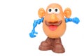 Plastic fat guy with brown mustache and protruding red tongue
