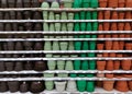 Plastic flower pots on shelves Royalty Free Stock Photo