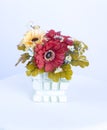 Plastic flowers decoration in vase Royalty Free Stock Photo