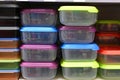 Plastic food containers on the shelf in the store.Plastic recycling, ecology concept Royalty Free Stock Photo