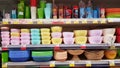 Plastic food containers on a shelf in a supermarket Royalty Free Stock Photo