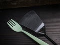 plastic fork and aluminum spatula