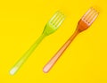Plastic forks pattern on blue background. Top view, flat lay Royalty Free Stock Photo