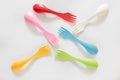 Plastic forks and spoons on White Background Royalty Free Stock Photo