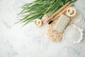 Plastic free background. Personal care products made from natural materials: bamboo tooth brushes, cotton pads, soap, green leaf. Royalty Free Stock Photo