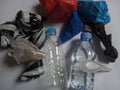 plastic free, bottles, used plastic ropes and bags, white background Royalty Free Stock Photo