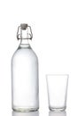 Plastic free concept:  glass water bottle and water glass isolated on white background with clipping path and copy space for your Royalty Free Stock Photo