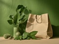 Plastic free set with cotton bag, glass jar, green leaves and recycled tableware top view. Zero waste, eco friendly Royalty Free Stock Photo