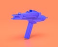 Plastic Futuristic sci-fi laser gun Toy, indigo blue hunting and adventure Weapon  on pinkish orange background, 3d rendering Royalty Free Stock Photo