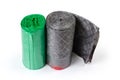 Plastic garbage bags in two rolls green and gray colors Royalty Free Stock Photo
