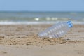 Plastic garbage dropped on the beach as poor environment and pollution