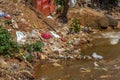 Plastic garbage floating in river. India, Nilgiri, Coonoor town. Royalty Free Stock Photo