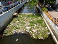 Plastic garbage in one of the canals, Khlongs, in Bangkok, Thailand