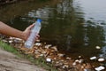 Plastic garbage in the river , pollution and environment in the water Royalty Free Stock Photo