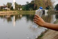 Plastic garbage in the river , pollution and environment in the water Royalty Free Stock Photo