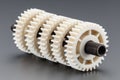 Plastic gears created by 3d printing on a threaded metal shaft, representing engineering and technology Royalty Free Stock Photo