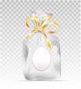 Plastic gift bag with gold shiny ribbon