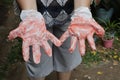 Plastic gloves stained by hair dye, close-up Royalty Free Stock Photo