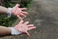 Plastic gloves stained by hair dye, close-up Royalty Free Stock Photo