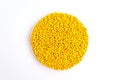 The plastic granules. Dye for polypropylene, polystyrene granules into a measuring container. Royalty Free Stock Photo