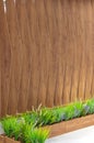 Plastic Grass Wooden Wall Royalty Free Stock Photo