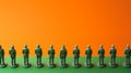 Plastic green army men in formation looking away. Royalty Free Stock Photo