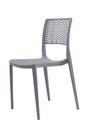 Plastic grey chair with a wicker back. Patio or cafe furniture. Royalty Free Stock Photo