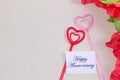 The plastic heart pairs with the happy anniversary card, with many flowers