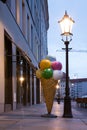 Plastic Ice Cream Cone Outside Cafe Under Street Lamp Afternoon