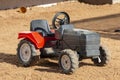 A Plastic Kids Ride On Tractor