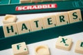 plastic letters on Scrabble board game forming the word : Haters Royalty Free Stock Photo