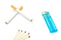 Plastic lighter, two cigarettes and matches Royalty Free Stock Photo