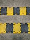 Plastic made yellow and black speed breaker