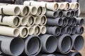 Plastic main pipes. A heap of polyethylene pipes for a water supply system. Royalty Free Stock Photo