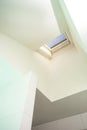 Plastic mansard or skylight window on attic with environmentally friendly and energy efficient thermal insulation Royalty Free Stock Photo