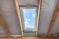 Plastic mansard window with double glasses and clear view on sky Royalty Free Stock Photo