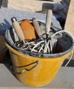 masonry bucket with tools for house construction