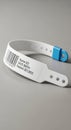 Plastic medical ID bracelet with white band and adjustable clasp. Features a barcode Royalty Free Stock Photo