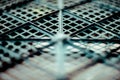 Plastic mesh, texture of black geometrical surface with depth of field Royalty Free Stock Photo