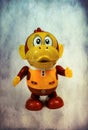 plastic monkey toy vintage photo effect added Royalty Free Stock Photo