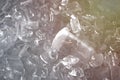 Plastic mug soak in a bucket of ice. Drink a cup of water is commonly used in the party. It is easy But drinking a cup of green Royalty Free Stock Photo