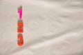 123 plastic multi-colored numbers lie on colored paper close up Royalty Free Stock Photo