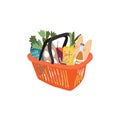 Plastic orange basket full of food, fruit, products and grocery goods. Natural food, organic fruits and vegetable. Department Royalty Free Stock Photo