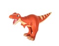 Plastic orange dinosaur toy, megalosaurus Royalty Free Stock Photo