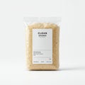 Plastic package containing a granular, light brown substance. Labeled \