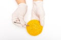 Plastic pellets . Colorant for polymers in granules. Plastic pellets in the hands with gloves and tweezers Royalty Free Stock Photo