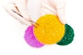 Plastic pellets . Colorant for polymers . granules. Plastic pellets in the hands with gloves and tweezers Royalty Free Stock Photo